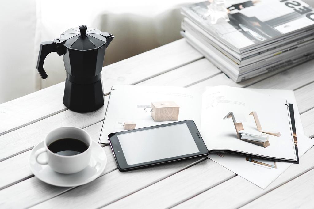 Open book and digital documents on screen